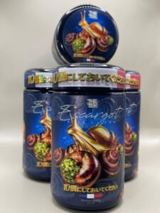ESCARGOT By THE TENCO close-up of jar and lid showing golden snail and Japanese text