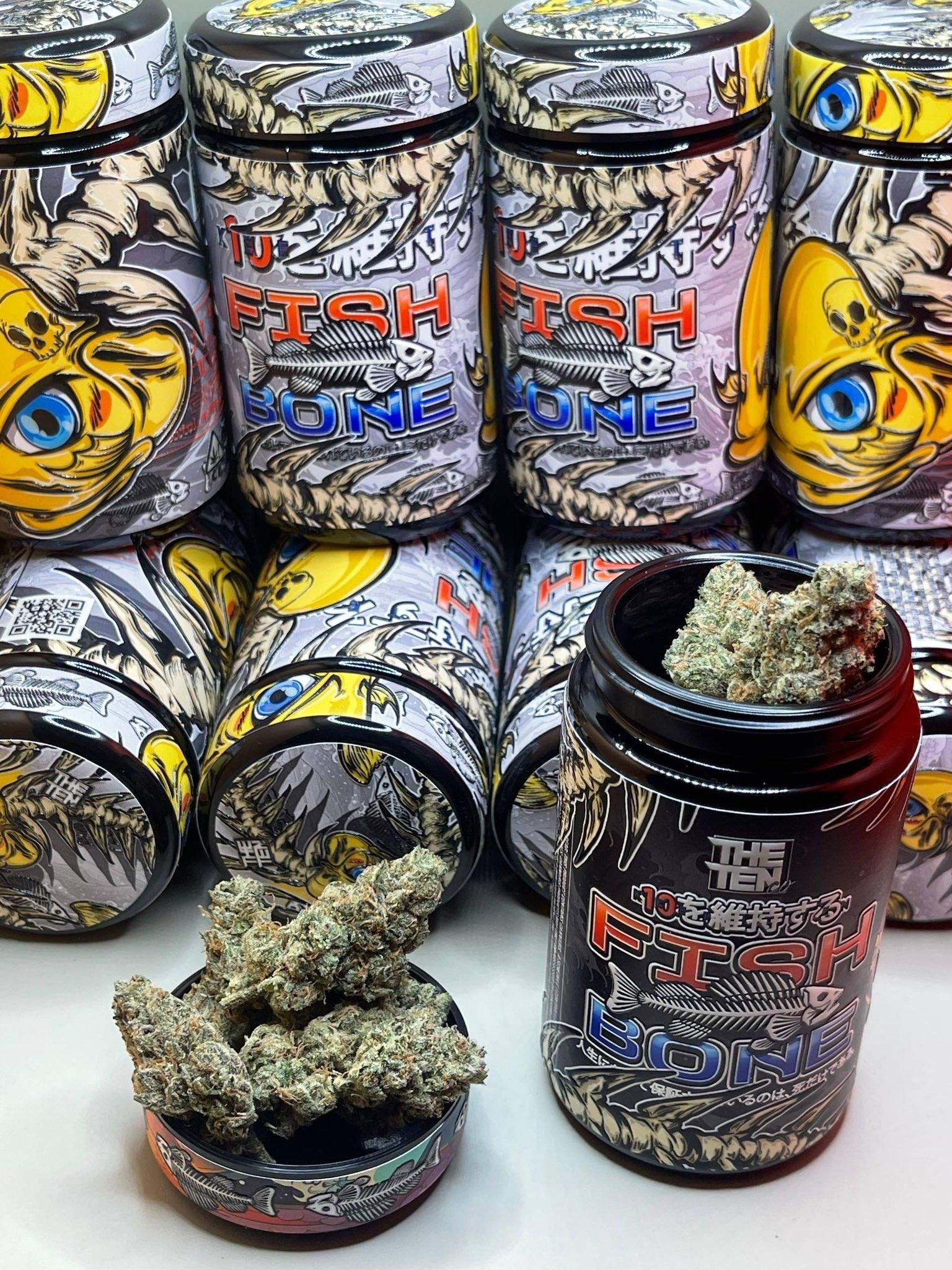 FISH BONE By THE TENCO open jar with dense frosty cannabis flower buds displayed