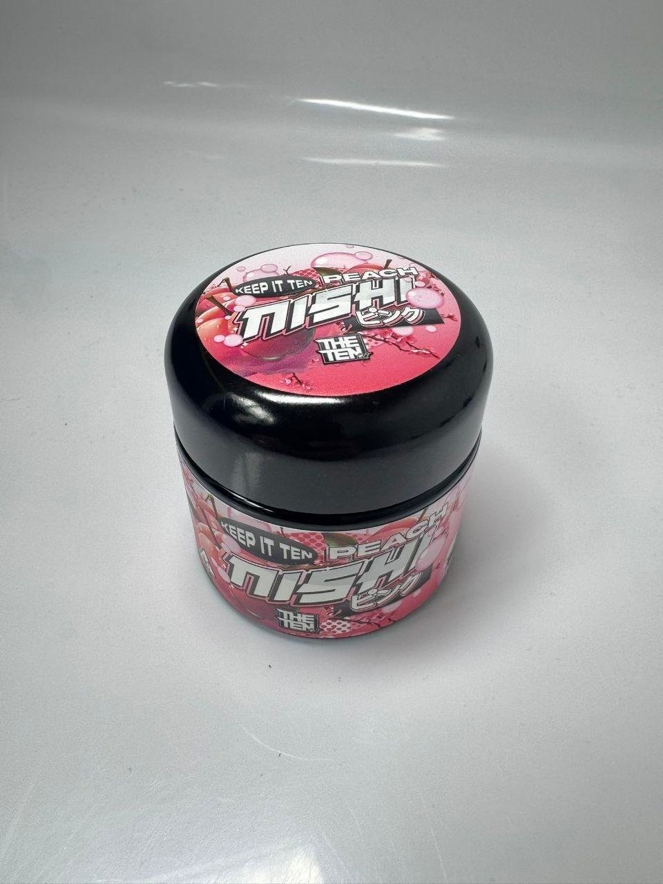 PEACH NISHI By TENCO sealed jar front view – premium THE TENCO hybrid flower with peach candy label