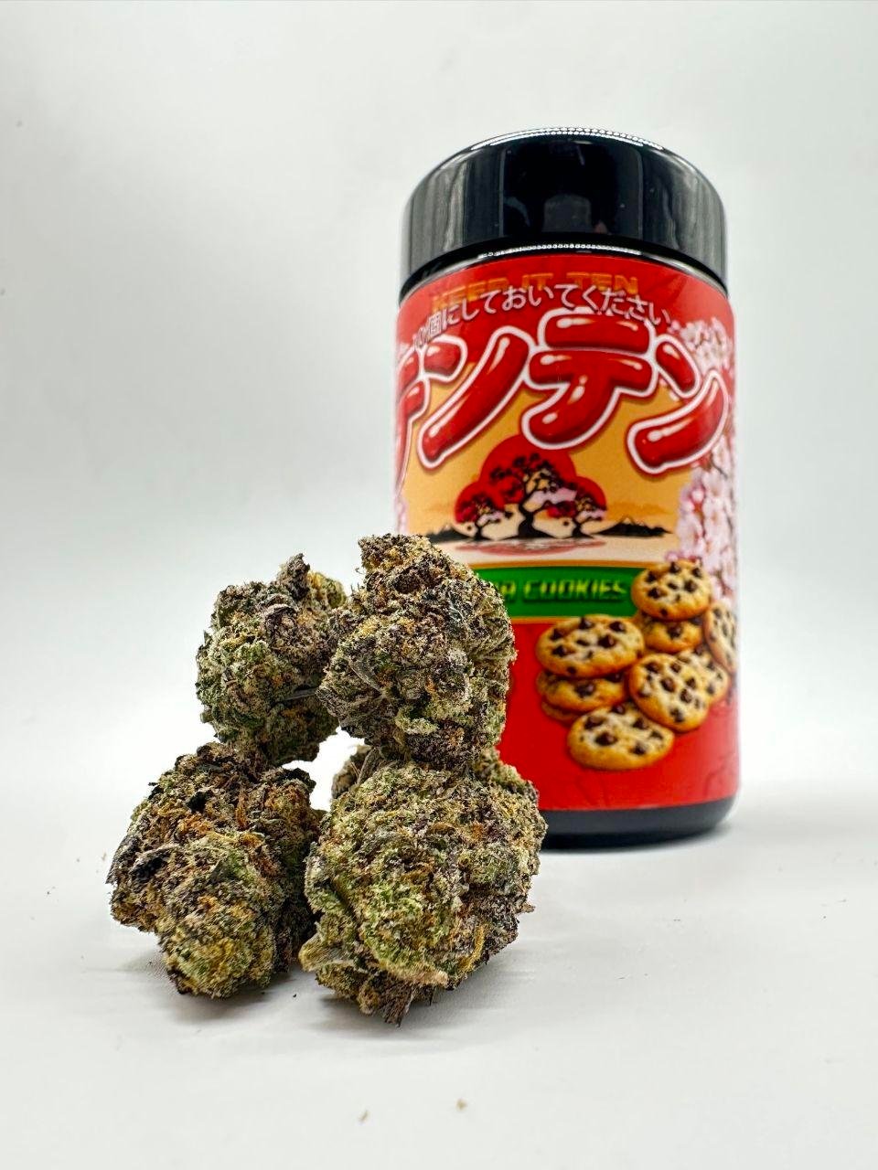 SAKURA COOKIES By TENCO cannabis buds next to sealed jar – dense frosty nugs