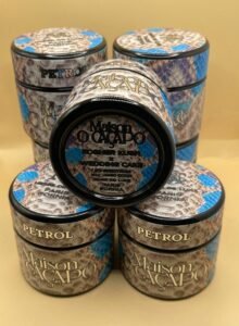 PETROL by MAISON O CACAPO luxury cannabis jars stacked with snakeskin design and blue accents showing premium packaging