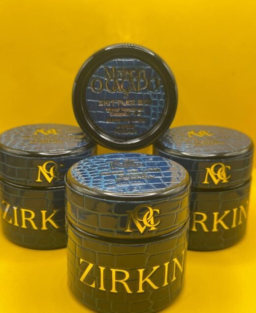 ZIRKIN by MAISON O CACAPO luxury designer jars stacked showing snakeskin blue packaging and Herbe De Luxe branding