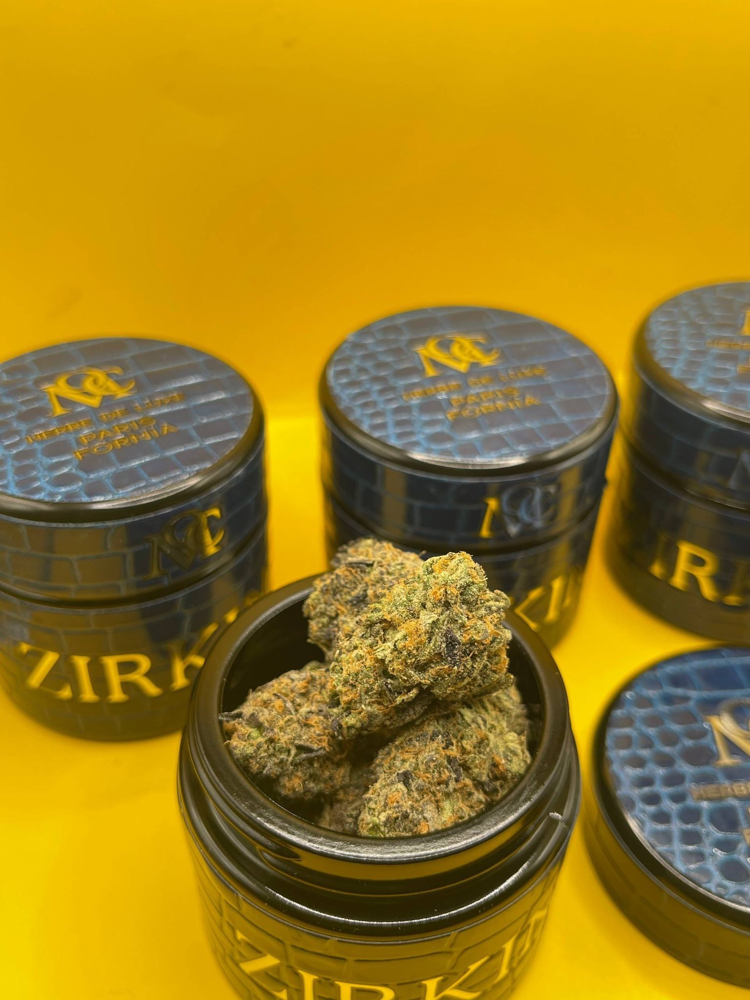 Close-up of ZIRKIN by MAISON O CACAPO premium cannabis flower showing dense trichome-covered Zkittlez BX3 buds